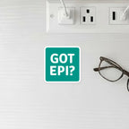 GOT EPI? allergy reminder sticker on nightstand next to glasses and outlet – practical allergy safety reminder for home use