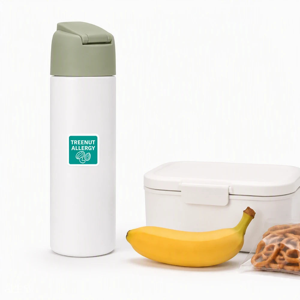 Tree nut allergy food reminder sticker on a water bottle, designed as a visible food allergy warning for everyday use.